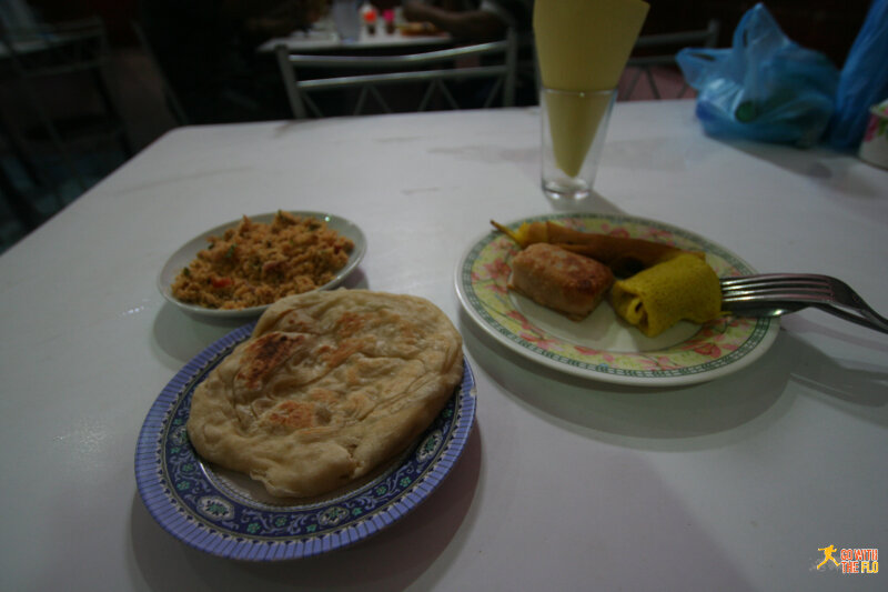 Typical Maldivian breakfast with Mas Huni (grated coconut, tuna, chopped chiles, onions and salt/pepper)