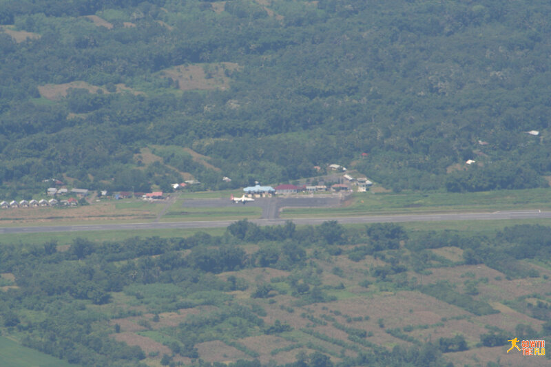 Aerial view from Bajawa (BJW). TransNusa Fokker 50 on the tarmac.