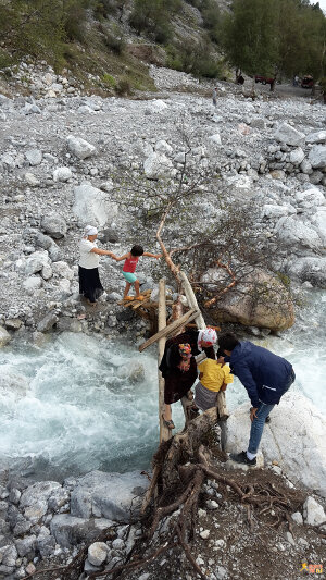 Crossing a bridge on the way to the big waterfall