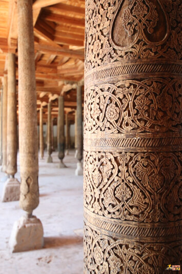 Carvings on wodden pillars inside the Juma Mosque