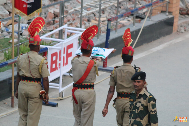 And the Indian flag being carried away