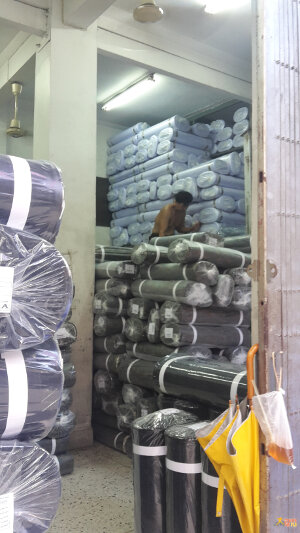 Warehouse full of black and white cloth