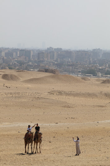 Happy tourists, less happy camels